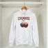 White women's Y2K cherries hoodie with bold cherries print and retro cozy aesthetic.