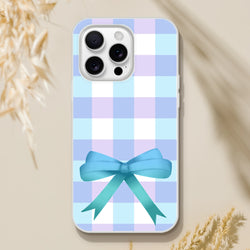 Pastel blue gingham bow iPhone case for iPhone 13–16 in a cute coquette aesthetic.
