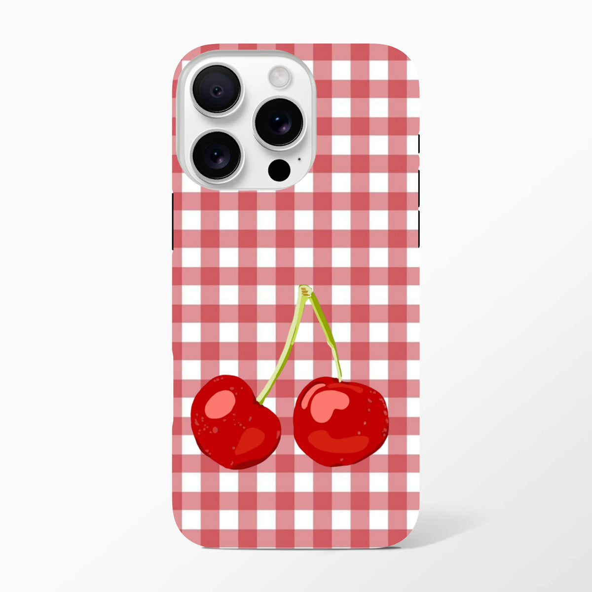 Red gingham iPhone case featuring two glossy cherries. Tough checkered cover for iPhone 13-16 with streetwear appeal and drop protection.
