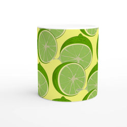Lime slice pattern ceramic mug with lime wedges on a bright yellow background.