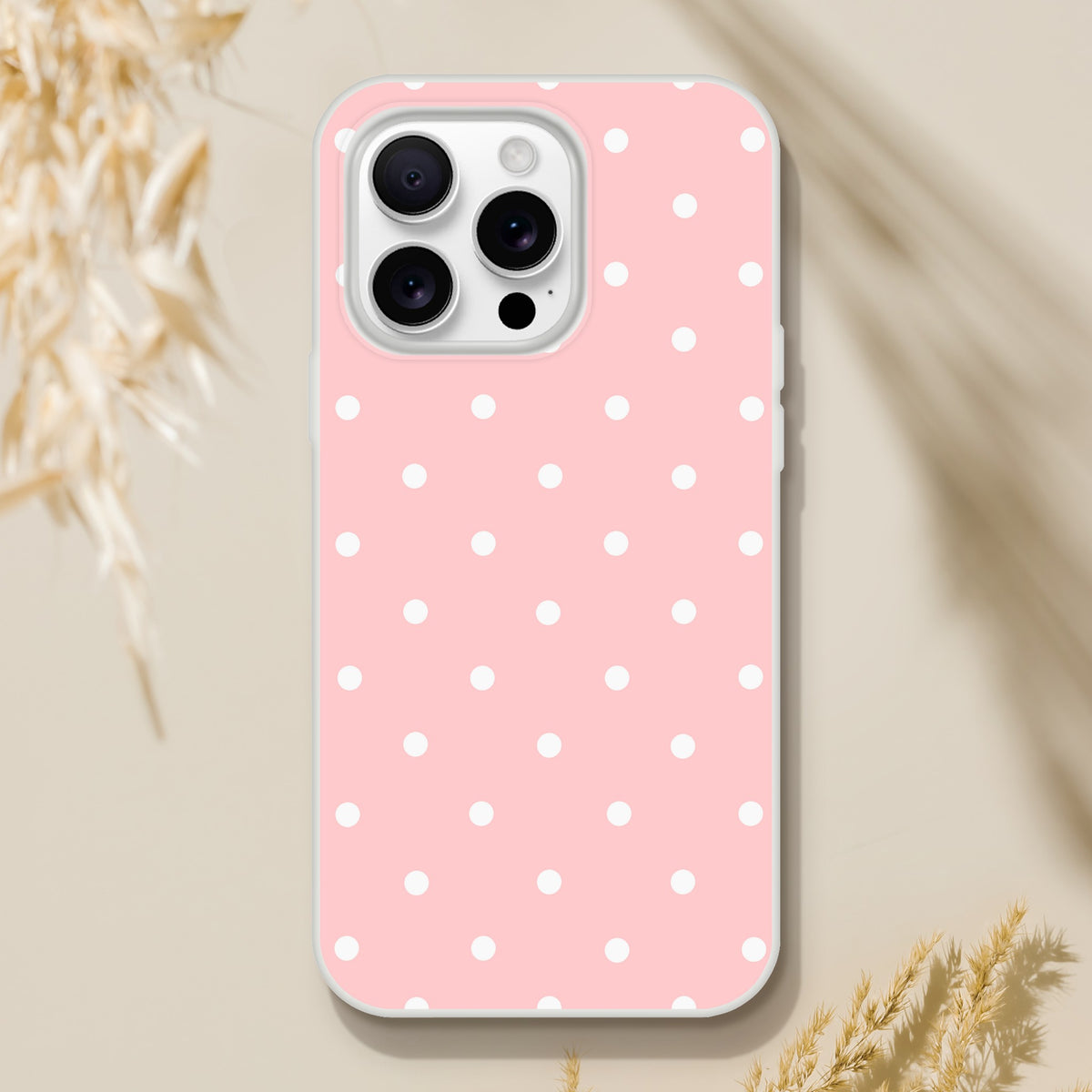 Pastel pink and white polka dot retro iPhone case featuring matte finish, shock-absorbing TPU protection, and slim profile for iPhone 13-16.