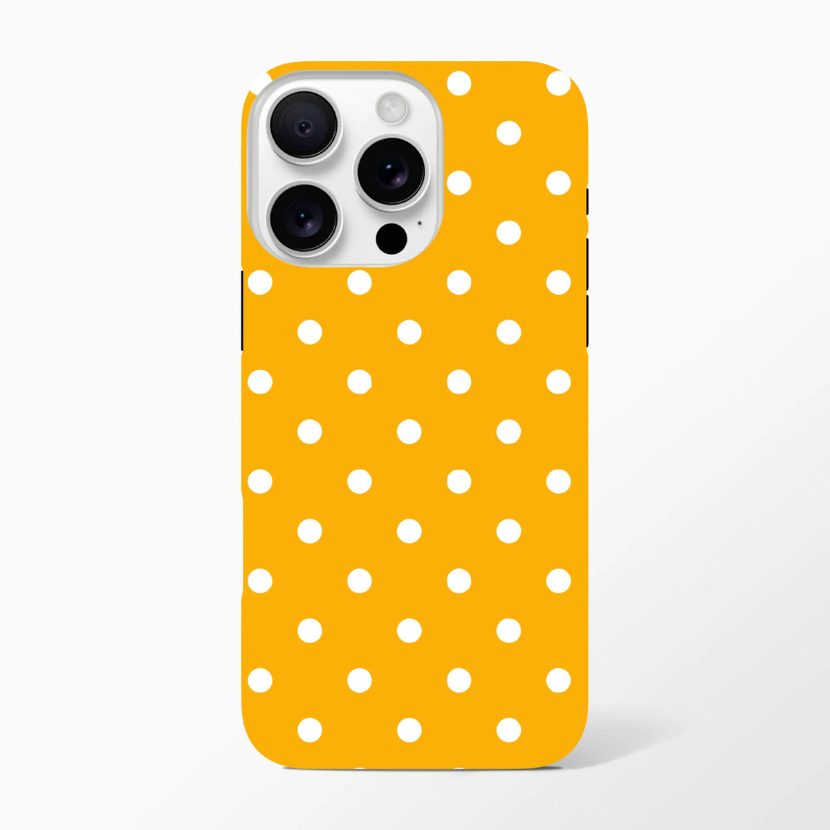 Orange and white polka dot tough iPhone case providing shock-absorbing protection and wireless charging support for models 13-16.