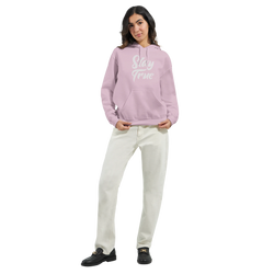 Woman wearing lavender Stay True hoodie with front pouch pocket and double-lined hood.