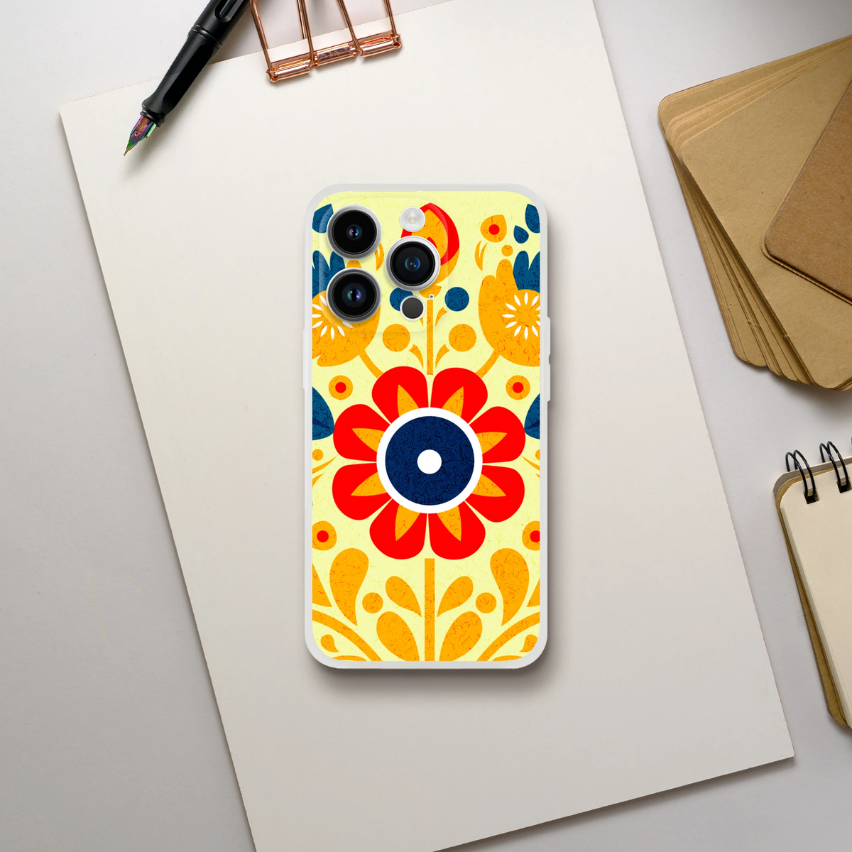 Vintage Floral iPhone Case (13-16) with retro aesthetic, yellow background and red petals, blue leaves; slim matte.