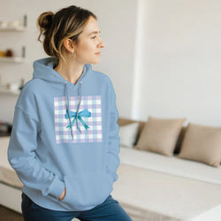 Light blue coquette pullover hoodie featuring a pastel gingham square graphic with a blue bow design on the chest.