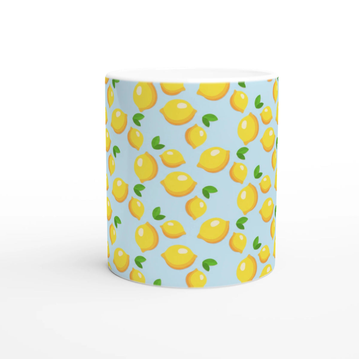 Cute mini lemon-pattern ceramic mug on a blue background, a charming citrus coffee cup for tea or coffee.