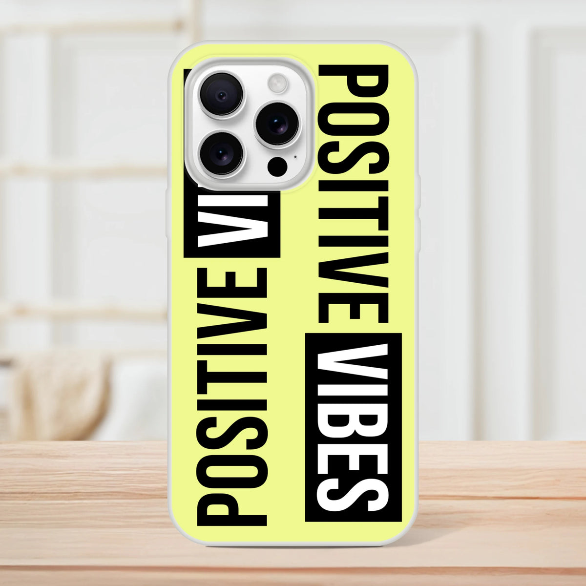 Bright neon yellow iPhone case for iPhone 13-16 with bold black POSITIVE VIBES slogan.