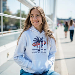 Palm Tree Women's Hoodie in white with palm graphic and California text, soft cotton-blend, relaxed fit.