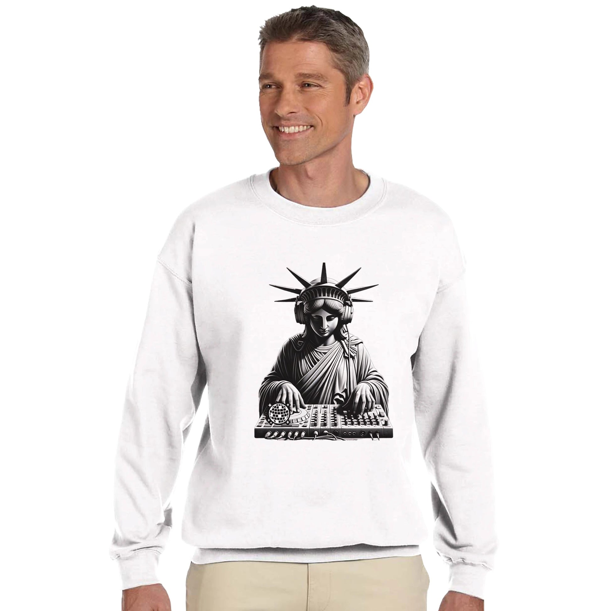 Man wearing a white men's graphic sweatshirt with a graphic of the Statue of Liberty using DJ equipment on a white background