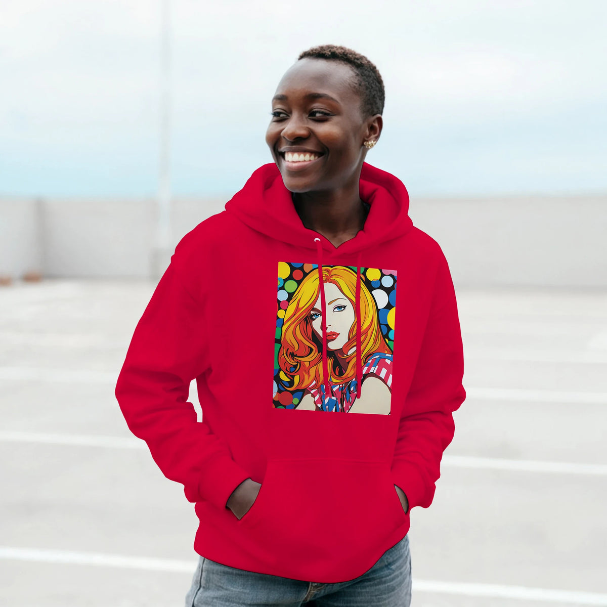 Red hoodie featuring colourful retro pop art print of a blonde woman against a polka dot background.