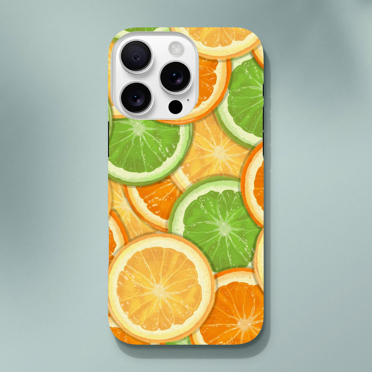Vibrant orange and lime slice pattern on a tough iPhone case. Durable citrus fruit phone cover designed for daily protection and streetwear style.