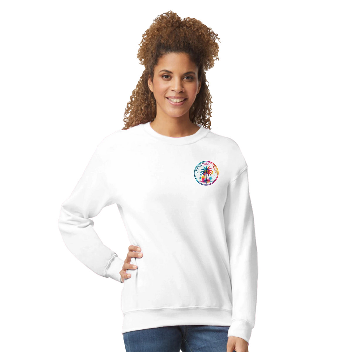 White crew neck sweatshirt featuring a colorful retro palm tree logo on the chest. Tropical streetwear for women.