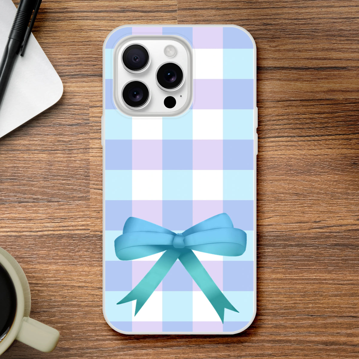 Blue Gingham Bow iPhone Case (13-16) in pastel blue tones with bow, cute coquette aesthetic