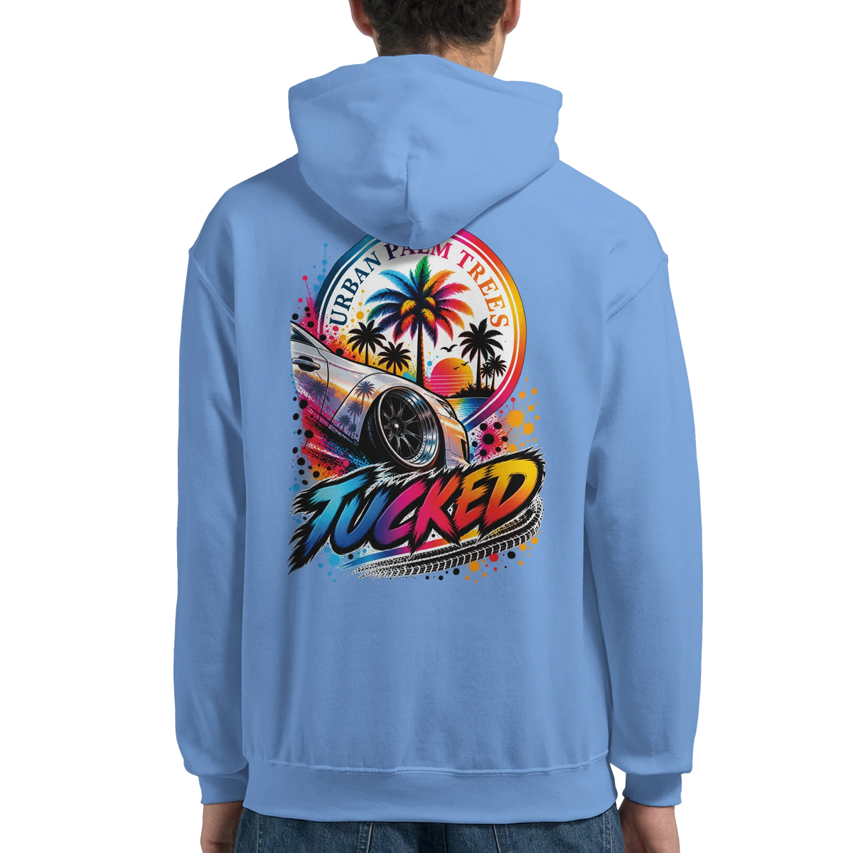 Blue men's hoodie featuring a colorful "Tucked" graphic with a lowered car, palm trees, and sunset design on the back.
