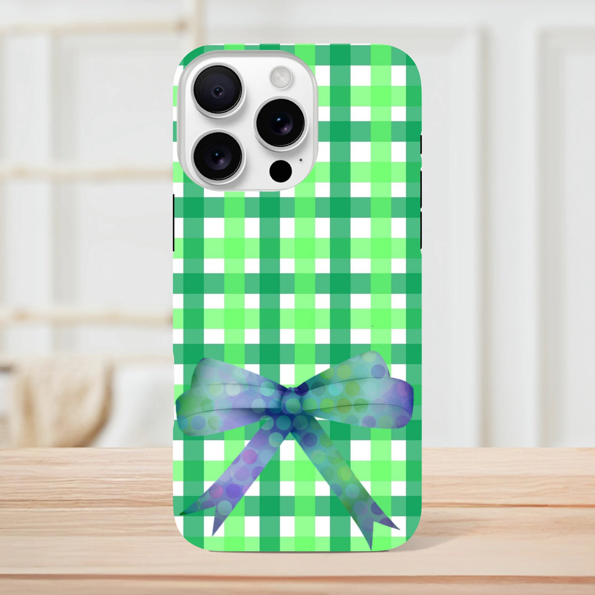 Green gingham iPhone case featuring a iridescent polka-dot bow for a cute coquette streetwear aesthetic.