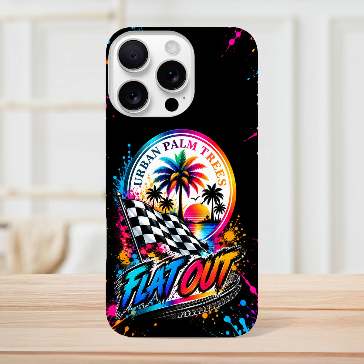 Flat Out Petrolhead iPhone case featuring Urban Palm Trees graphic, checkered flag, colorful paint splatters, and retro sunset car culture design on black background.