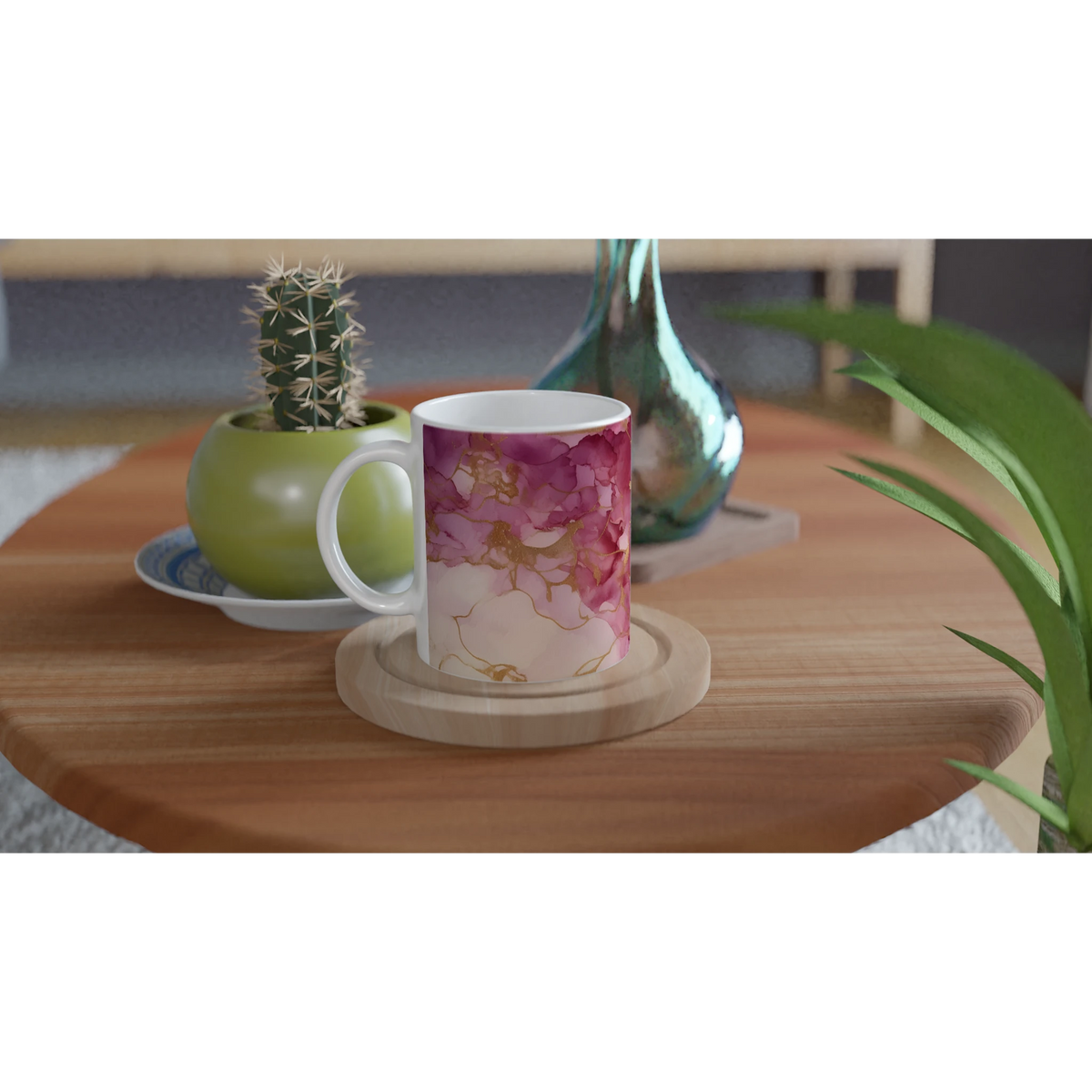 Pink marble mug with blush rose gold abstract pattern on a wooden table beside green plants.