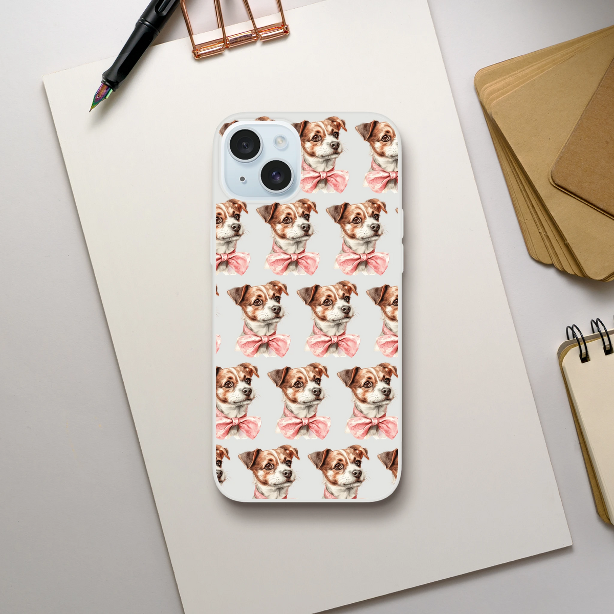 Clear protective phone case with a repeating puppy head pattern and pink bows for iPhone 13-16