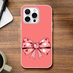 Cute pink cream bow iPhone case for iPhone 13-16 with coquette aesthetic and pastel bow design.