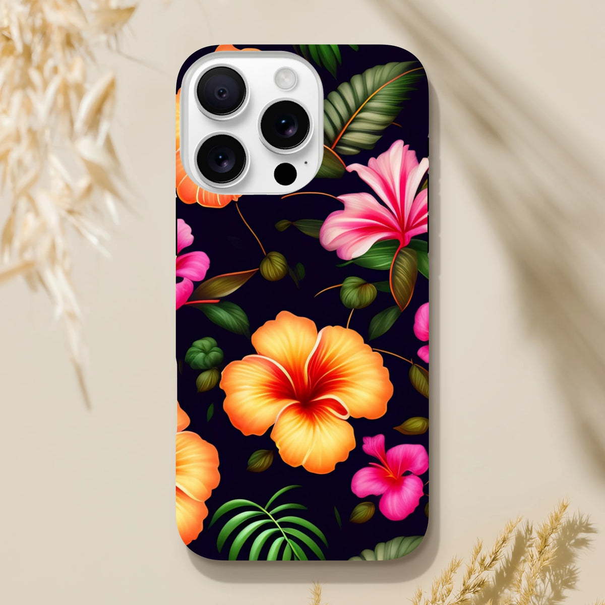 Tropical floral tough iPhone case featuring vibrant orange and pink hibiscus flowers with green leaves on a dark background.