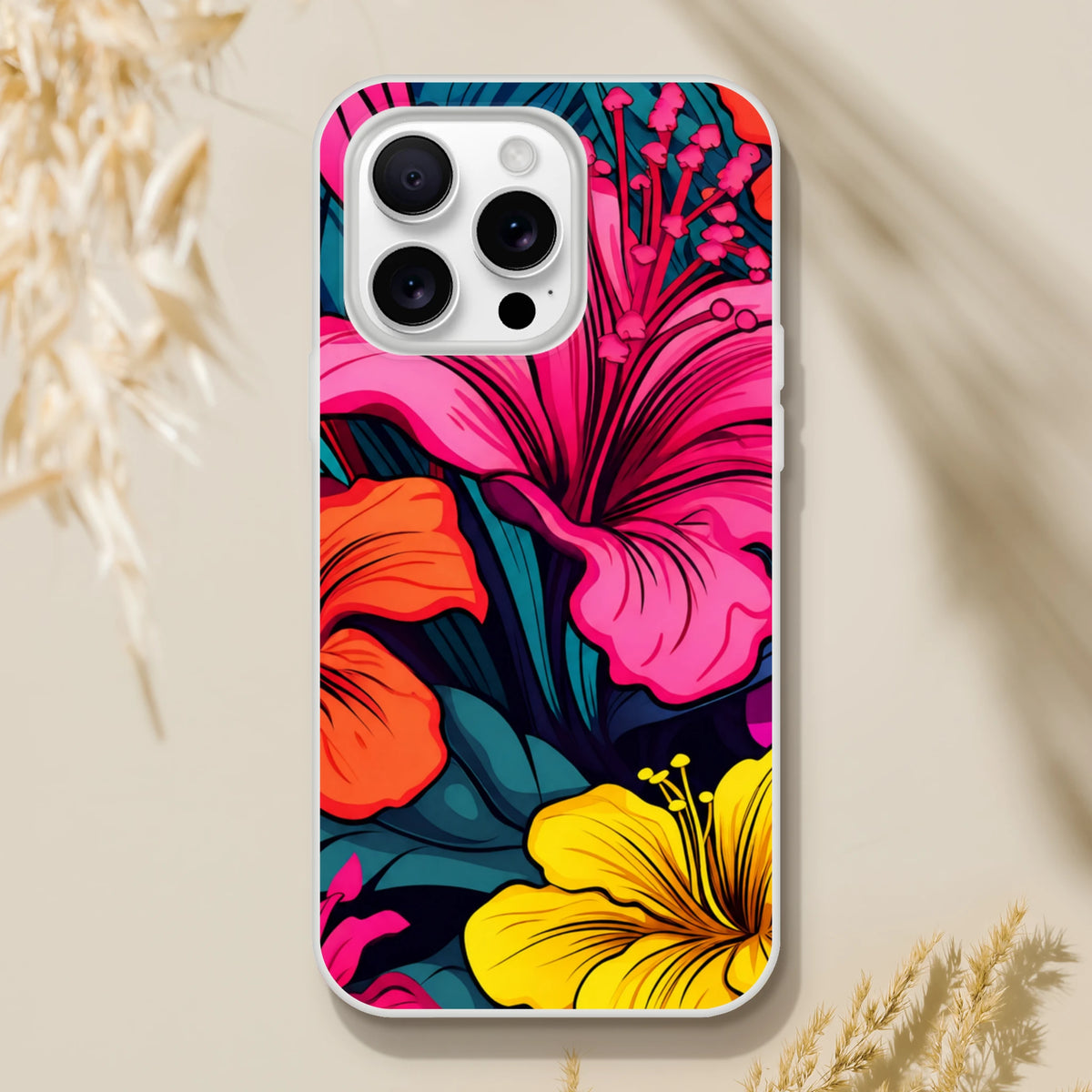 Colorful tropical hibiscus floral iPhone case for iPhone 13–16 with vibrant pink and yellow blossoms.