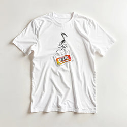 White t-shirt featuring a vintage cassette tape with unspooling tape and vibrant orange label, embodying retro music aesthetic streetwear.