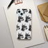 Phone case with wraparound gangster Doberman pattern on white background.