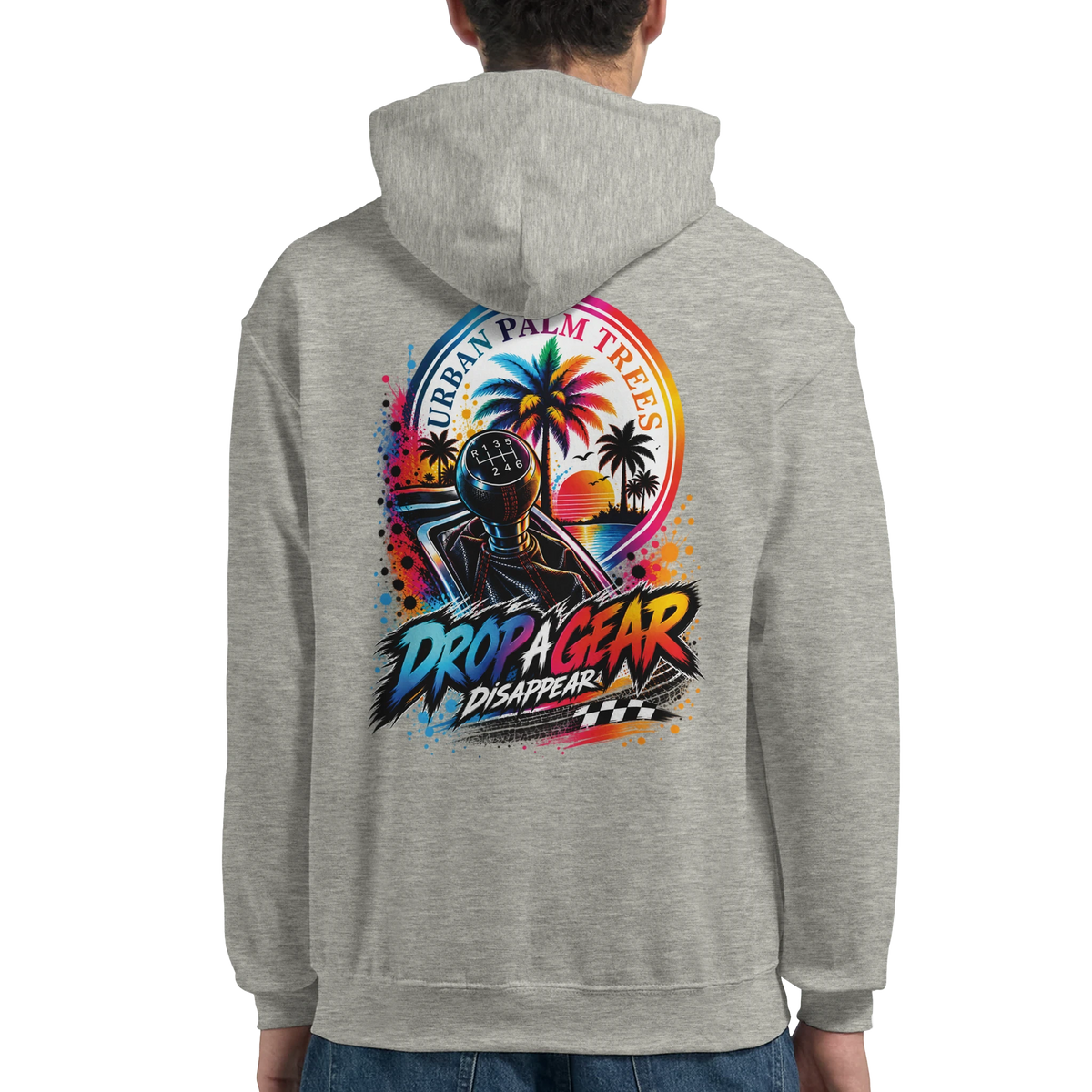 Grey hoodie back featuring "Drop A Gear Disappear" graphic with manual shifter, palm trees, and retro sunset design. Petrolhead streetwear.