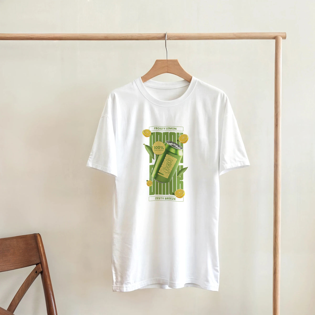 White t-shirt featuring a retro green lemon soda can graphic with citrus slices and zesty breeze typography.