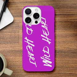 Wild Heart Purple Tough iPhone Case for 13-16 with wraparound white slogan print and shock-absorbing protection.