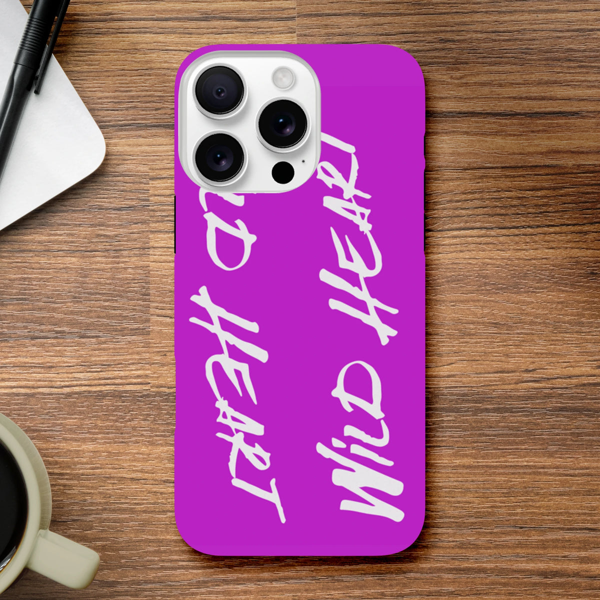 Wild Heart Purple Tough iPhone Case for 13-16 with wraparound white slogan print and shock-absorbing protection.