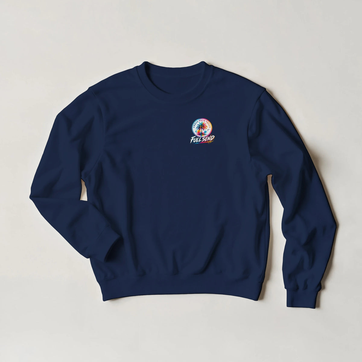 Navy blue crewneck sweatshirt featuring a colorful Urban Palm Trees Full Send circular logo on the chest.