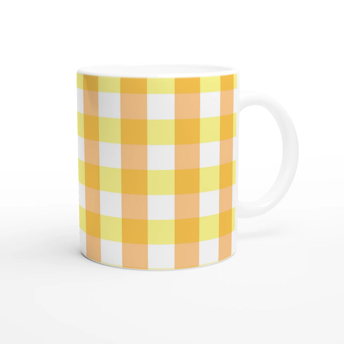Yellow gingham ceramic mug with a white handle; cute checkered coffee cup for home, office, or gifting.