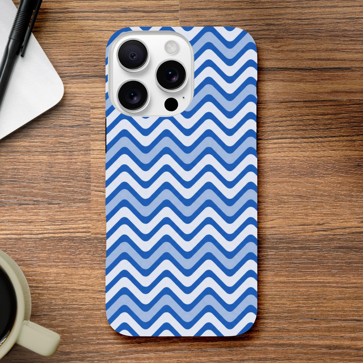 Blue and white retro zigzag iPhone case with glossy finish and shock-absorbing TPU protection for daily impact resistance.