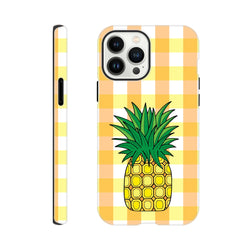 Yellow gingham iPhone case featuring a tropical pineapple illustration. Cute durable back cover with drop protection for commutes and festivals.