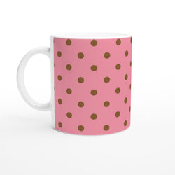 Pink ceramic mug featuring retro brown polka dots. 11oz coffee cup for home, office, or gifting.