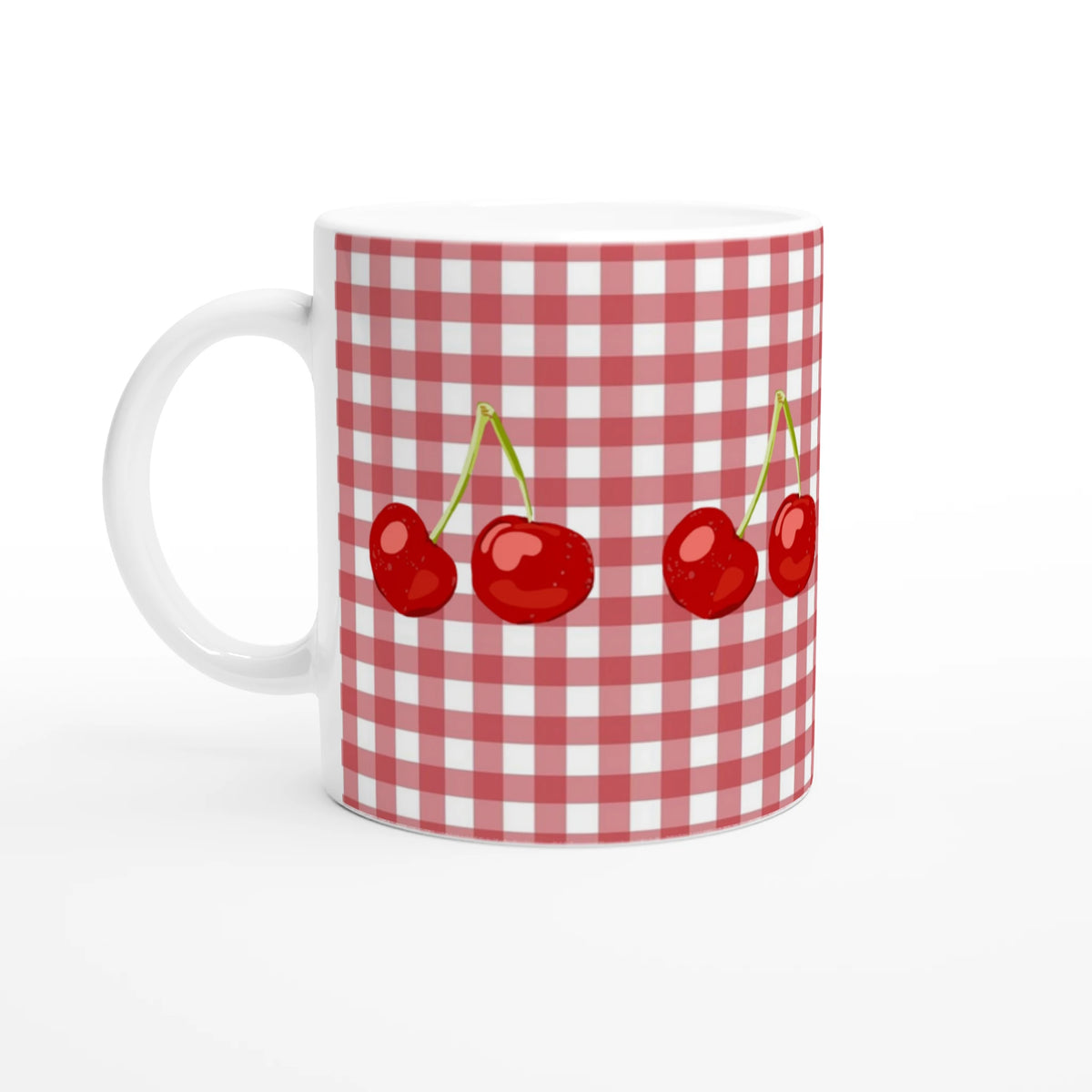 Cherry-patterned red-and-white gingham ceramic mug with cherries, cottagecore style.