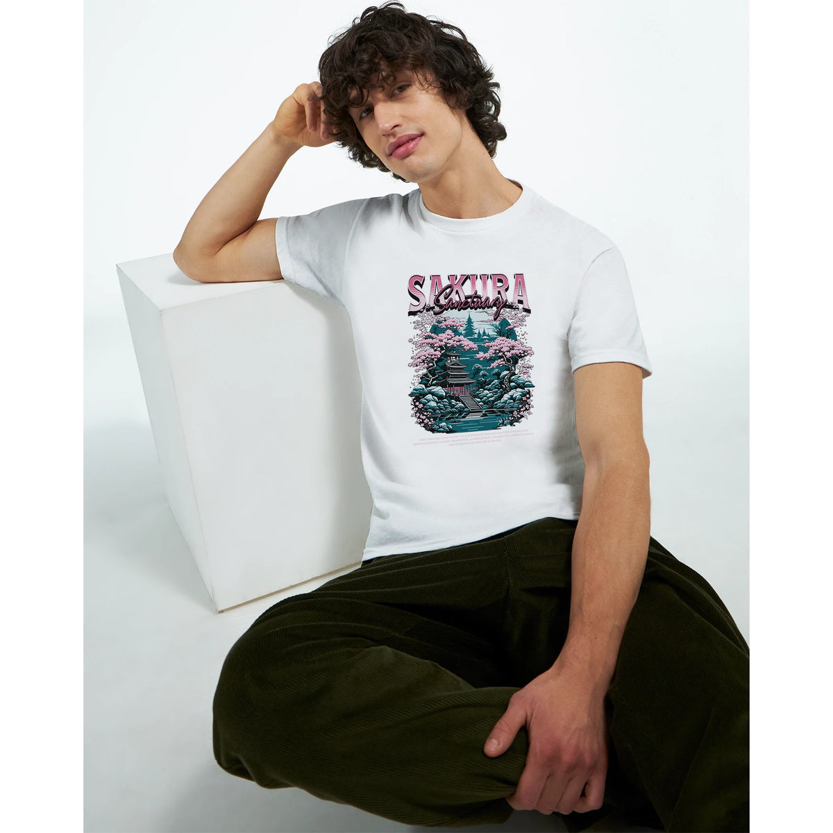 Man wearing white Japanese Sakura graphic T-shirt featuring a cherry blossom motif and a crew neck.