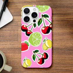 Pink iPhone case featuring cherry, lime, and lemon sticker art on a vibrant background. Shock-absorbing cover for daily use.