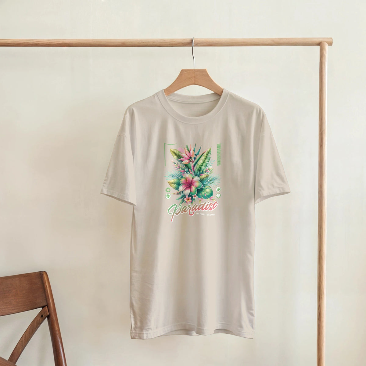 Paradise tropical floral graphic tee on beige cotton blend, short sleeve crew neck, sizes S–XL.