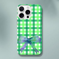 Green gingham iPhone case with a holographic polka dot bow, featuring a cute coquette aesthetic for iPhone 13-16.