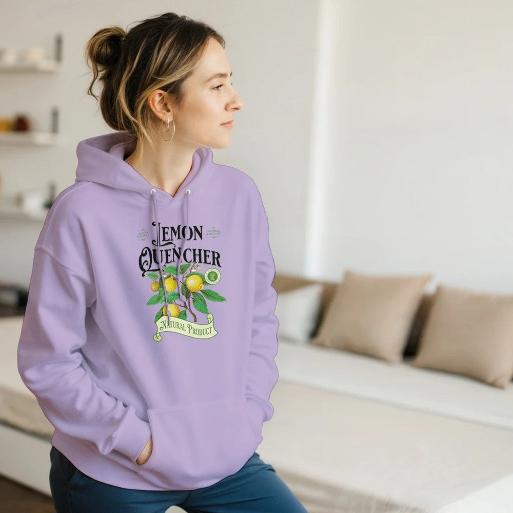 Woman in lavender Lemon Quencher graphic hoodie with lemon plant design.