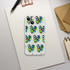 Transparent Chill Dog phone case for iPhone 13-16 with repeating sunglasses dog graphic holding a green popsicle