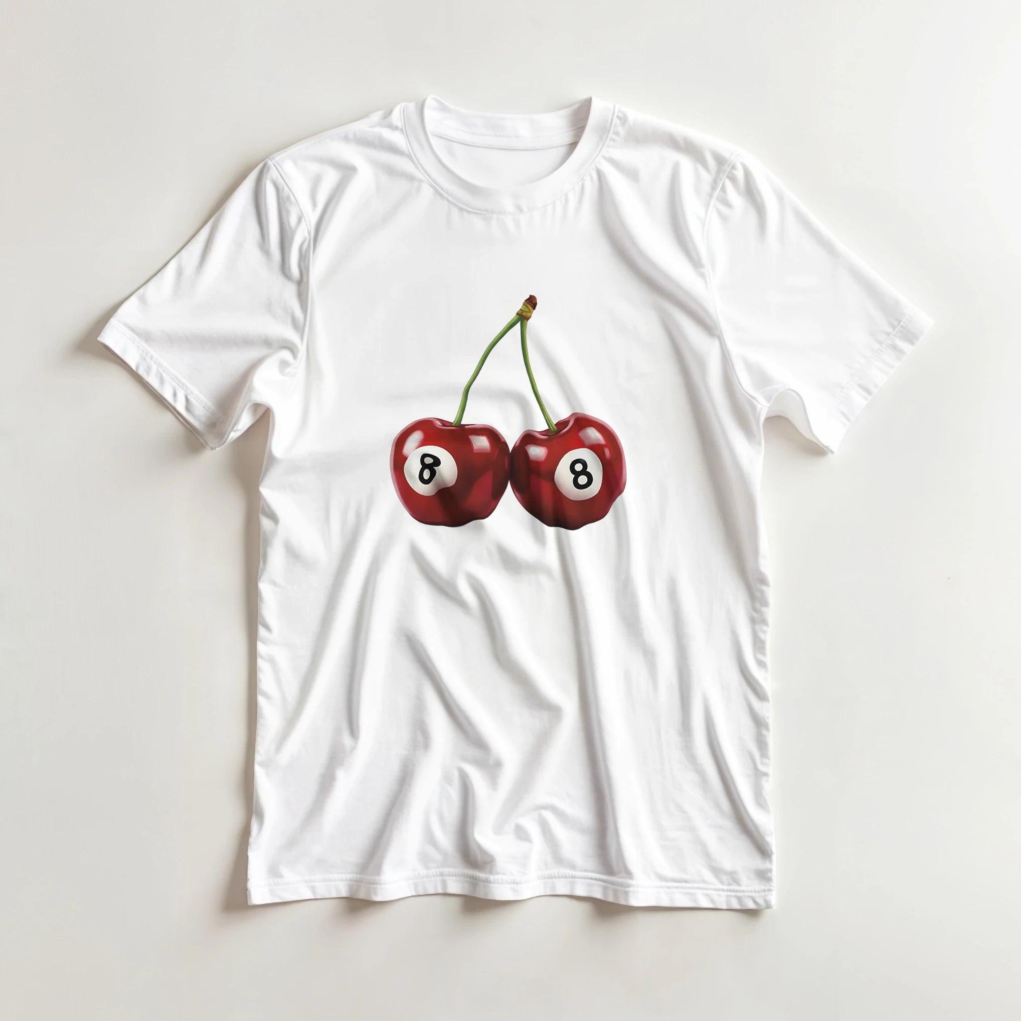 White women's T-shirt featuring two red cherries with white circles containing the number 8.
