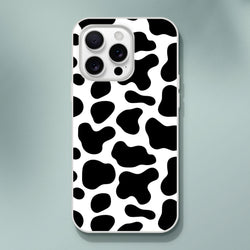 Black and white cow-print iPhone case for iPhone 13-16 with bold Y2K animal style.