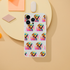 Clear protective phone case with a repeating colorful dog wearing sunglasses design for iPhone 13-16.