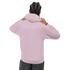 Back view of a person wearing a soft pink cotton-poly hoodie with a hood and ribbed hem.
