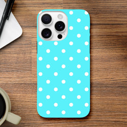 Turquoise & white polka dot tough iPhone case with glossy finish and drop protection on wooden desk.