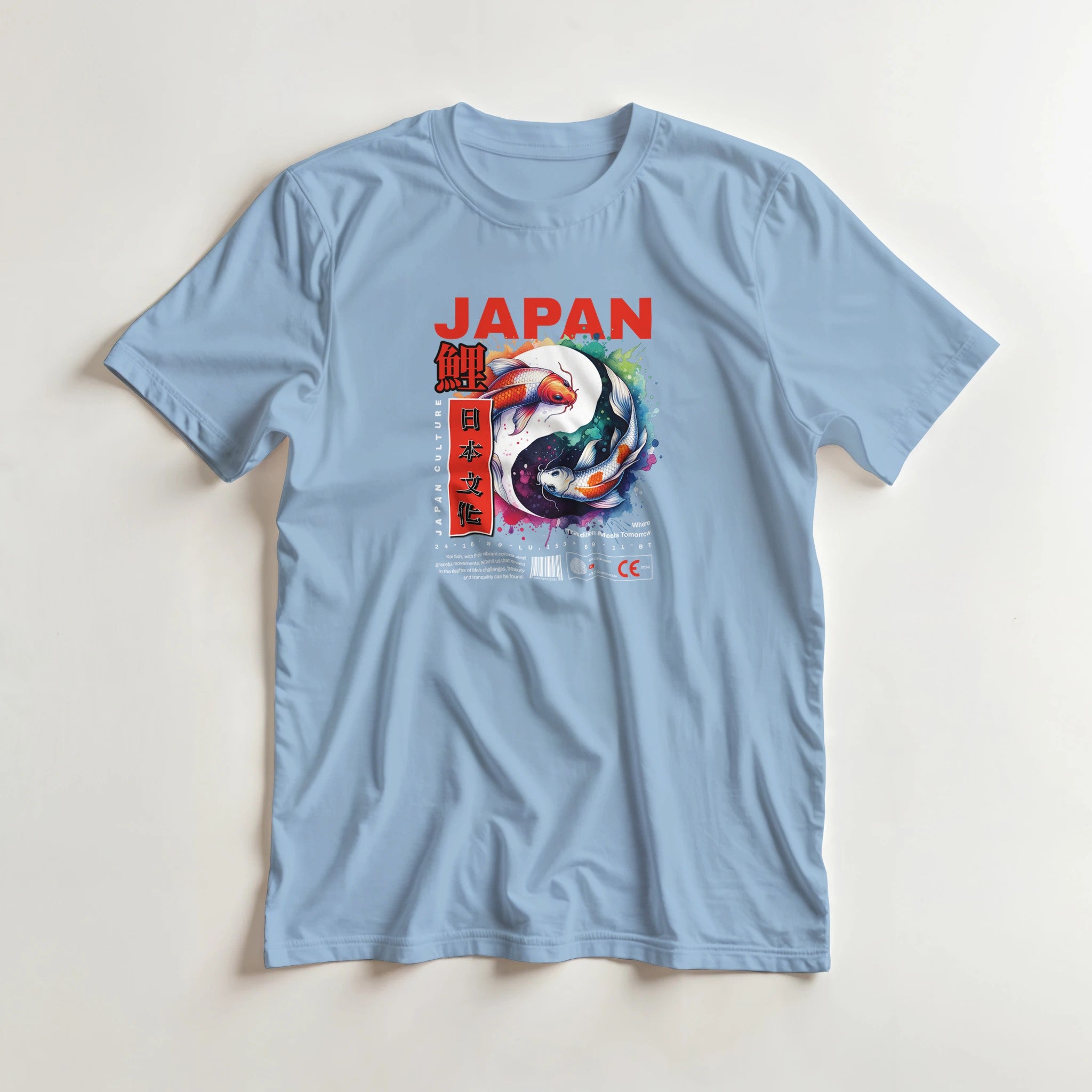 Light blue Japanese men's graphic T-shirt with koi fish art and bold red JAPAN text.