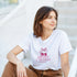 White cotton-blend women's T-shirt featuring pink cherries graphic